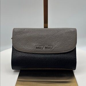 Pre-loved Miu Miu Madras Leather Wallet.